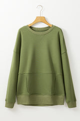 Ample sweatshirt with pockets and crossed seams *