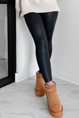 Leggings negros de alto consumo con bolsillos