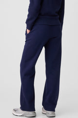 Decreeed size pants with tightening cord lined as a solid navy blue fleece