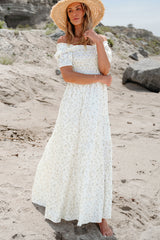 Long white dress with ruffles *