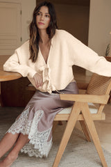 Jet stream cardigan ample knitted with butterfly knot on the front and v -neck