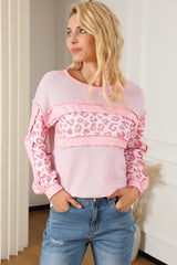 Alto en tejido incorporado con costuras expuestas y mosaicos de leopardo rosa