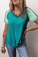 T-shirt green with V-neck and apparent seams