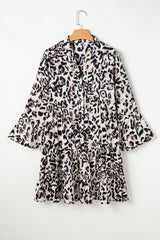 Robe noire à imprimé léopard boutonnée sur le devant *