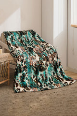 Large multicolored flannel blanket with western style pattern