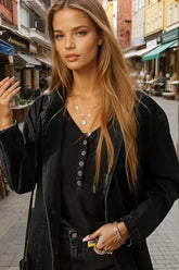 Veste en jean noire avec poches latérales *