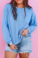 Sweatshirt with pearl sleeves and drooping shoulders, round neck