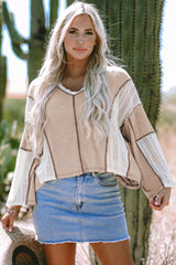 Top superior con detalles de crochet pergamino y costuras aparentes