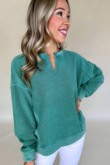 Sweatshirt with drooping shoulder and plain colored colored collar