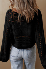 Short black sweater in Twisted Twisted mesh