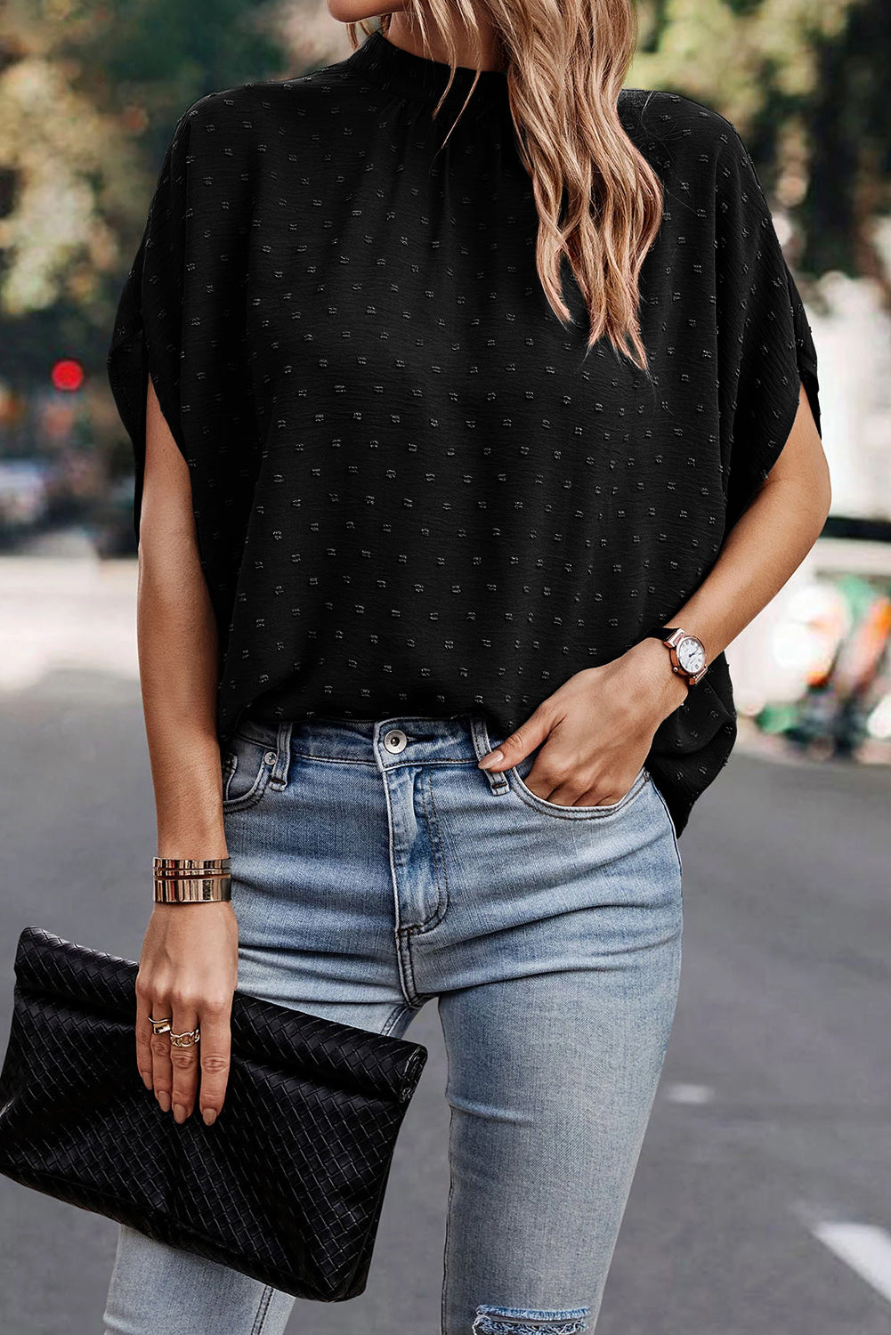 Chemisier noir à pois suisses, col montant, manches chauve-souris-A WOMAN WE LOVE