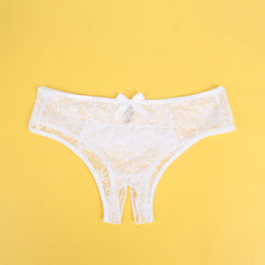 Culotte blanche ouverte en dentelle florale