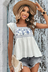 Chemisier péplum blanc à buste brodé et col carré-A WOMAN WE LOVE