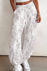Pantalon de survêtement baggy beige à imprimé camouflage