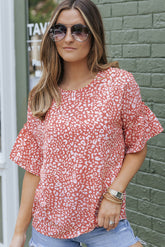 Pink t-shirt with fluffed sleeves and leopard polka dots