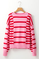 Pull ample rose à rayures et manches bouffantes