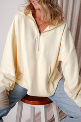 Sudadera suelta beige con bolsillos de canguro y flash de semi fermentadores forrados con vellón