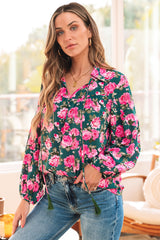 Green blouse with puffy sleeves and tied collar with floral print *