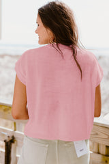 Suéter rosa alto con mangas cortas *