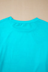 Amplio con mangas largas y bloques de colores con flores azules