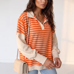 Sweat-shirt à rayures orange et blocs de couleur, coupe ample, col et épaules tombantes