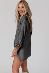 Dark grey ribbed oversized top with rolled up sleeves and chest pocket