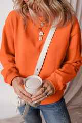 Dropped shoulder terry sweatshirt with solid fleece lining in russet orange