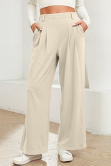 Pantalon large beige à taille élastique texturée de couleur unie