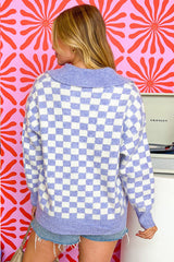 Pull violet à carreaux et boutons, grande taille