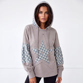 Sweat à capuche ample bleu à patchwork floral et étoiles
