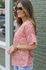 Pink t-shirt with fluffed sleeves and leopard polka dots
