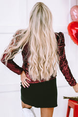 Haut bordeaux à sequins et col montant *