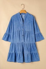 Mini-tambora azul cielo en Chambray con volantes y mangas 3/4 en varios niveles y cuello en V dividido