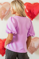 Phalaenopsis herida texturizada unida con mangas hinchadas y cuello redondo