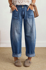 Jean baril bleu à taille haute, coutures courbes et revers