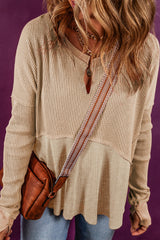 Light French beige waffle knit patchwork top with exposed seams and split collar