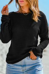 Black high with long sleeves and drooping shoulders *