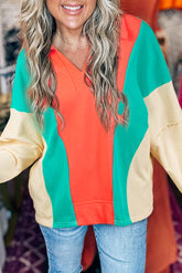 Amplio V -Neck en V -neck y bloqueo de color naranja de toronja