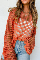 Orange tunic with handle knitting sleeves open to crochet