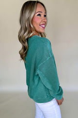 Sweatshirt with drooping shoulder and plain colored colored collar