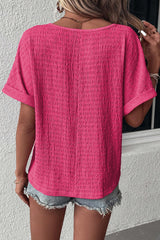 T-shirt textured pink lively pink with rolled sleeves and v * collar