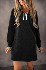 Black right-down mini-darling in jacquard with zipper on a quarter