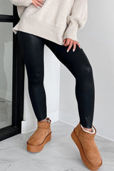 Leggings negros de alto consumo con bolsillos