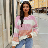 Pull rose à manches bulles en tricot texturé color block *