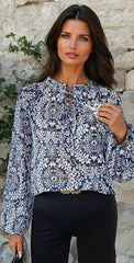 Tribal lace -up and ruffle print blouse *