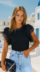 Haut en tricot côtelé noir à manches volantées *