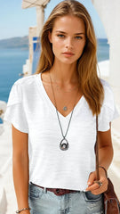 Camiseta blanca en tejido en relieve con mangas pétalas *