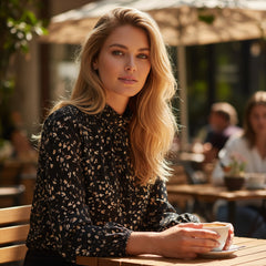 Ploted blouse with rising collar and lantern sleeves *