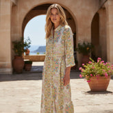 Vestido midi blanco con botón de impresión de cintura alta y cachemir