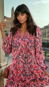 Mini-robe à volants et manches longues *